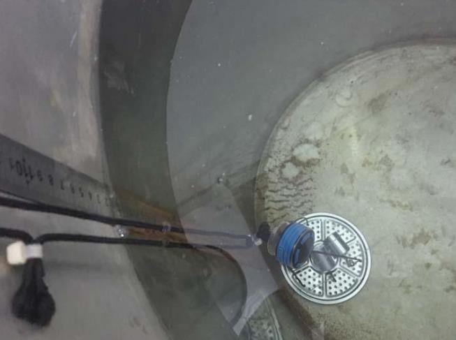 bluetooth speaker undergoing waterproof test